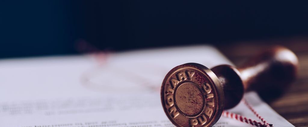 notary public ink stamp on signed document. law concept notary public ink stamp on signed document. law concept